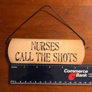 Nurse call the shots sign